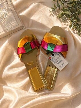 Metallic Gold Slide Mules with Pink and Green Knot Accent